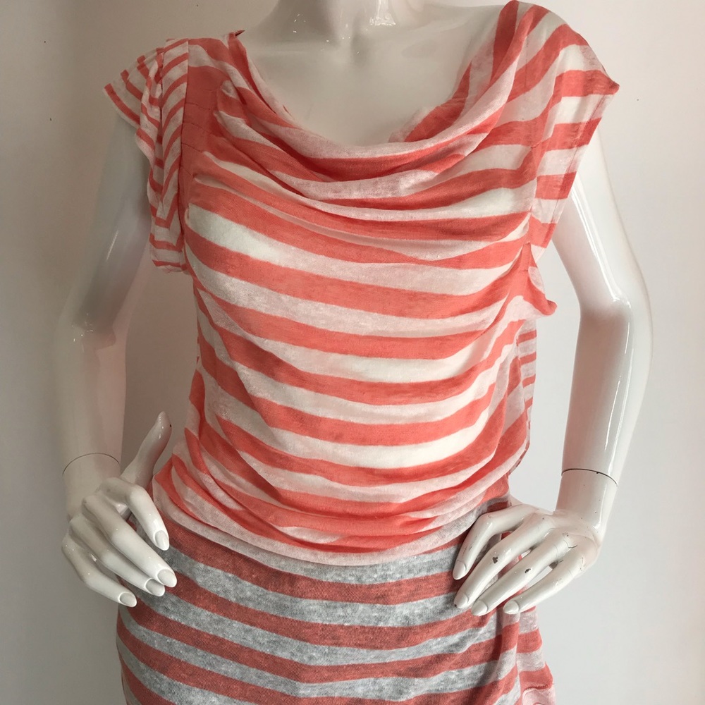 Sleeveless Tunic Top with Side Ruffle.